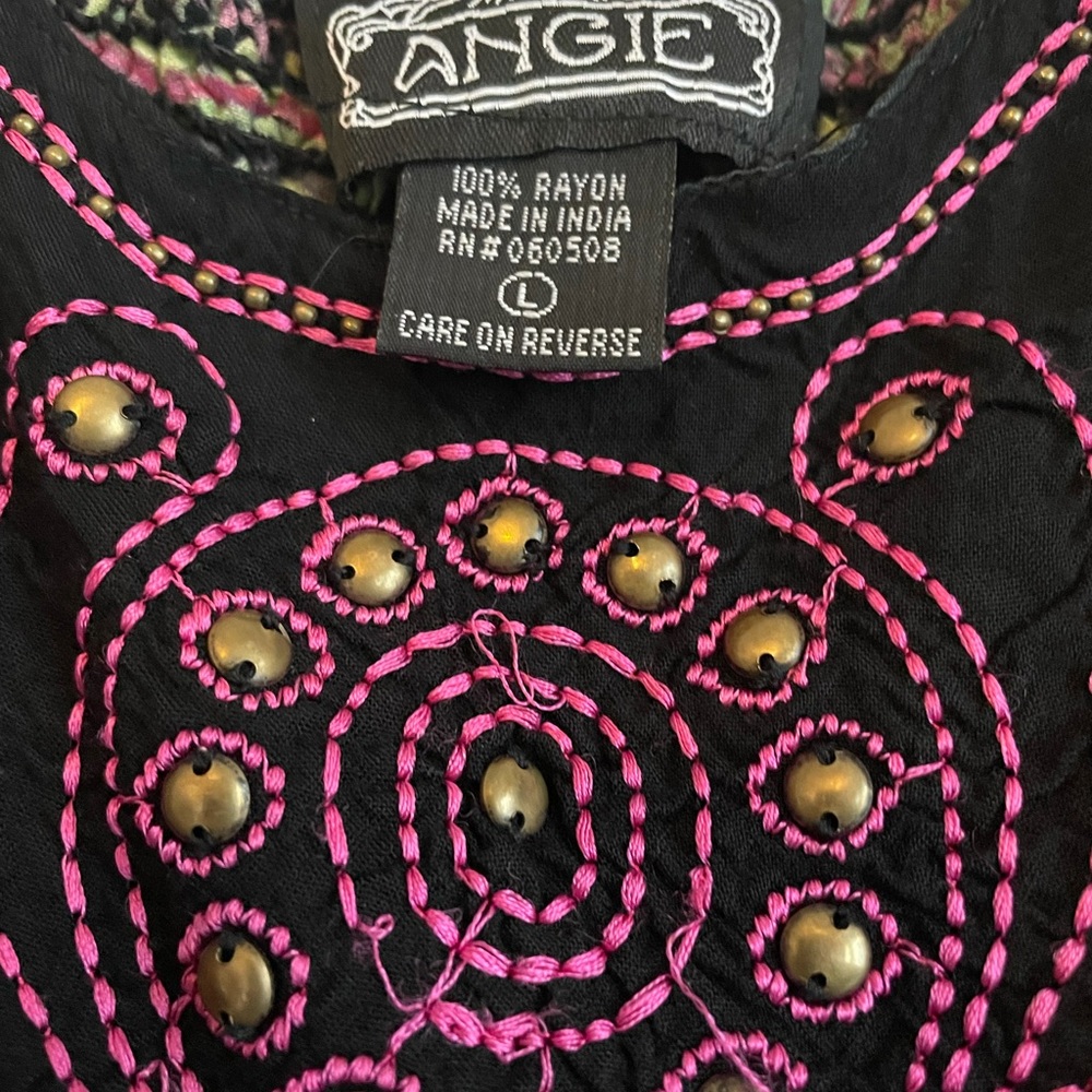 Size L tank too with great embroidered detail